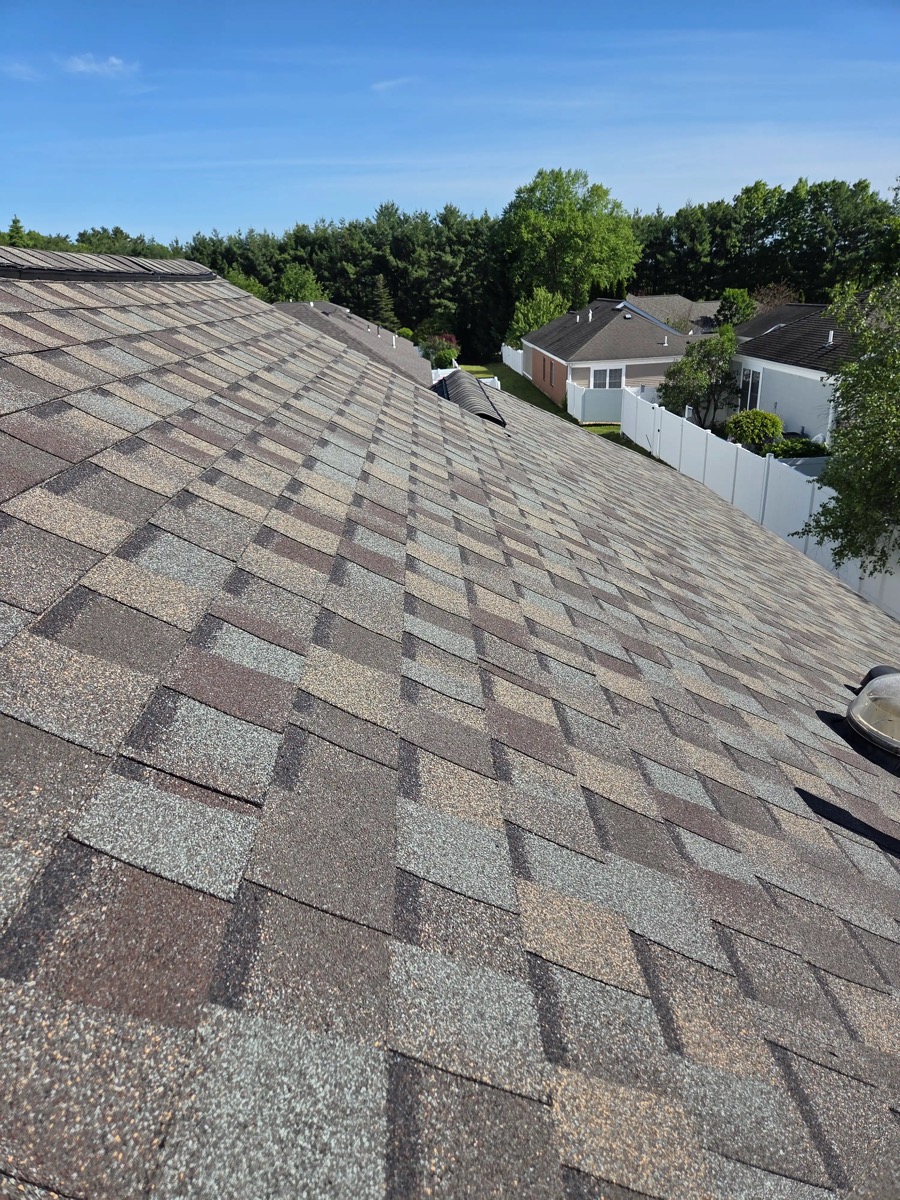 Residential asphalt shingle roof on a New Hampshire home