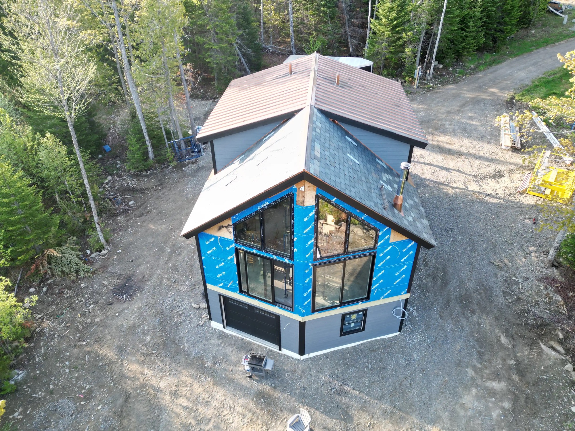 Residential metal roofing and roof-edge details on a New Hampshire home